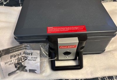 First alert Lock box never used. Comes with key