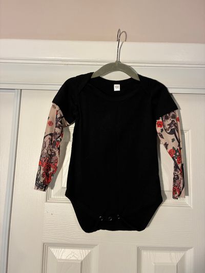 Unknown Size 100, black onesie with tattoo long sleeves 2T
