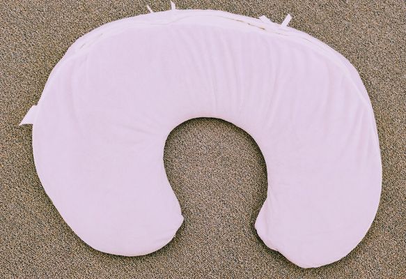 Boppy Nursing pillow with purple plush cover