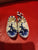 a pair of miniature Delft blue ceramic Dutch clogs a pair of miniature Delft blue ceramic Dutch clogs