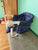 Portable baby high chair hooks onto table Navy blue, side & back storage pockets, machine washable