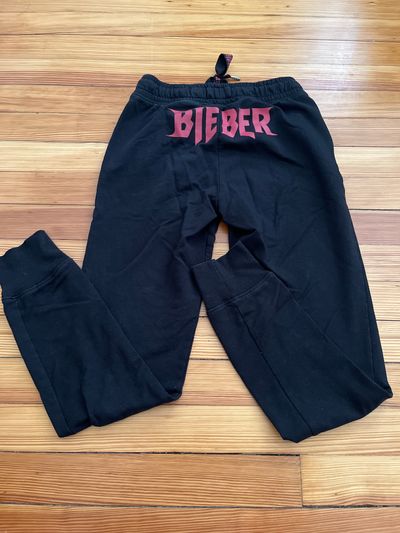 H&M Divided Black sweatpants with pockets. Bieber on back and ties Women's - XS