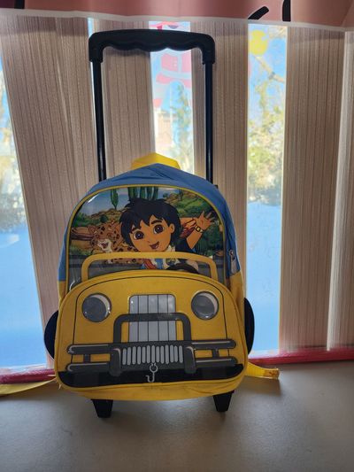 Go, Diego, Go!" rolling backpack. Nickelodeon "Go, Diego, Go!" rolling backpack.
