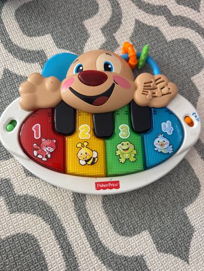Fisher price Laugh and learn puppy piano lights up plays songs
