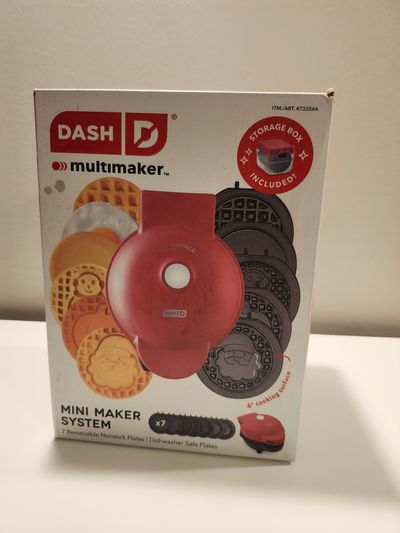 Dash mini waffle maker New. Received as gift, never used