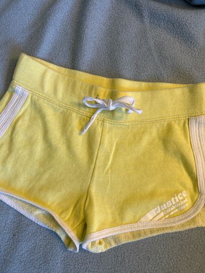 Justice active Yellow shorts, white trim 7-8