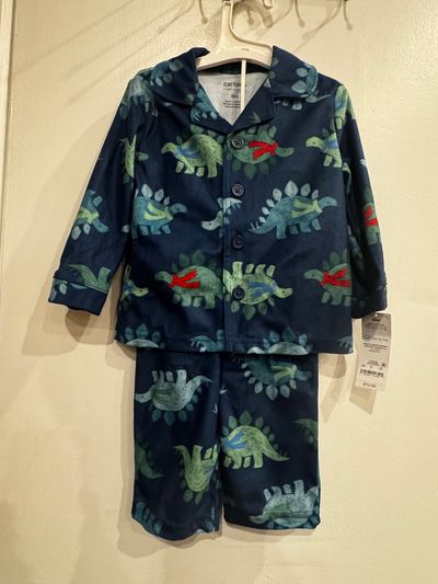 Brand new Carters 2 piece boys dinosaur pjs Brand New Baby Boy pajamas size 18 months. 2 piece 18 Months