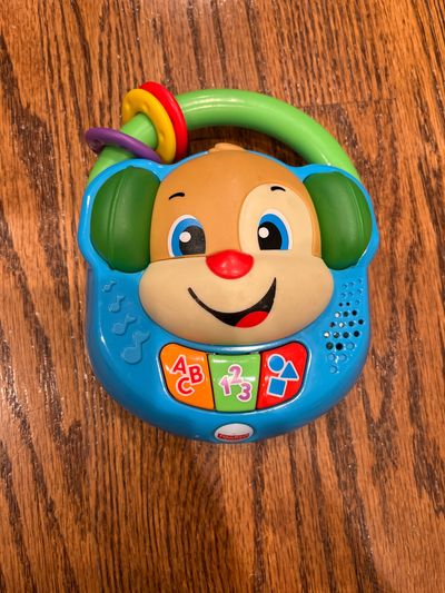 Fisher price plays cute songs about colors shapes And counting also lights up
