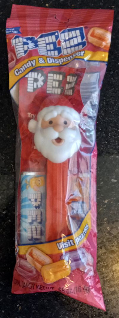 Santa Pez Dispenser and candy unopened