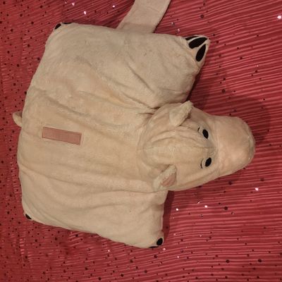 unknown Pink Pig pillow folds up great for the car