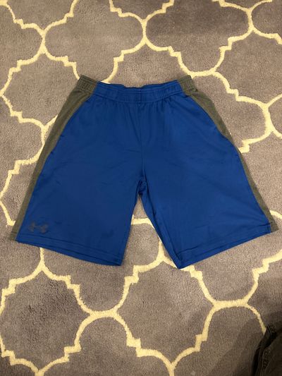 Under armour 7 Blue and gray sport shorts 14-16