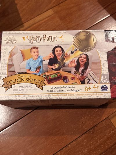 Create a new Harry Potter catch the golden snitch Game retail $20