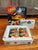 Mattel Jurassic World Uno set in tin container