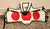This is a Rhingo Taekwondo chest guard, size me The guard features red circular targets on a white background.