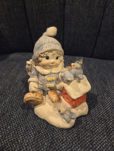 Snowbaby figure with Birds