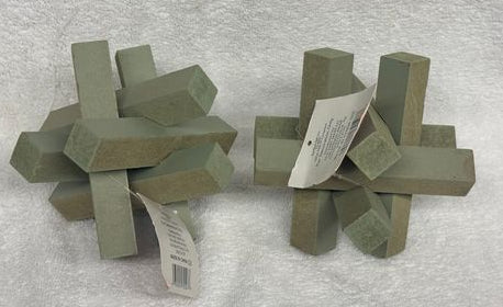 2 Brand New green wooden puzzle sculptures. 2 Brand New green wooden puzzle sculptures.