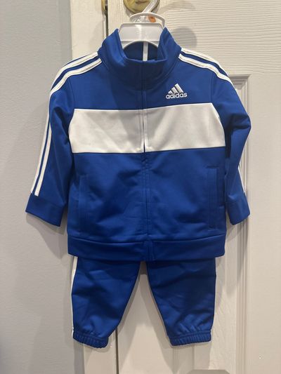 Brand new Adidas outfit Blue never worn 12 Months