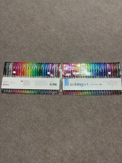 KingArt 50 Gel Pens. Glitter and non-glitter. Packs fold in half.