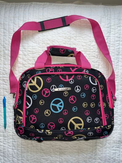 Rockland Like New Carry On Bag, black. Many pockets.