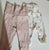 H&m foldover pants 2 pack pink and floral Marked nb but fits like 0-3. Both same size photo angle bad 0-3 Months