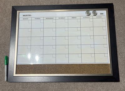 Quartet 17X23 magnetic dry erase calendar with cork board. 2 magnets