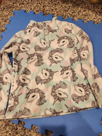 Place unicorn print fleece pullover with a quarter-zip closure. 7-8