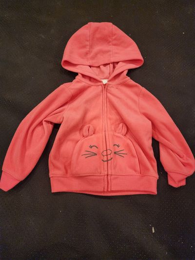 Carter hooded jacket features a coral pink fleece material 18 Months