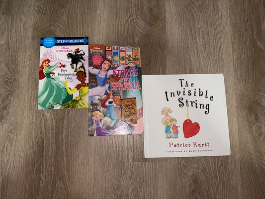3 books:The invisible string, Disney princess 5 enchanted tales, and Disney Princess stories that sparkle