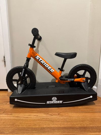STRIDER 2-in-1 12" Balance Bike and Rocking Base 12 Kids Bike