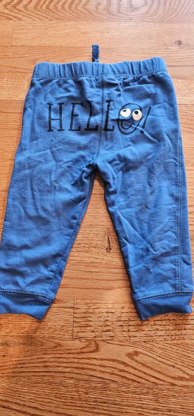 First Impression Like new graphic sweat pants w/ smile face prints on the back 24 Months
