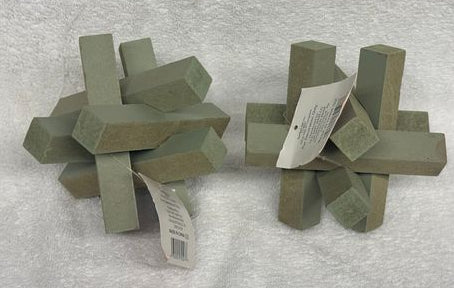 2 Brand New green wooden puzzle sculptures. 2 Brand New green wooden puzzle sculptures.
