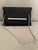 Jessica McClintock Black textured evening bag