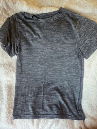 Champion short sleeved shirt size 12/14  10-12