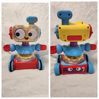 FP TALKING ROBOT Lights music and moves