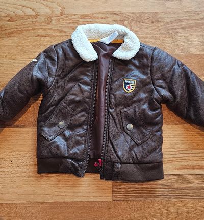 NA This leather like bomber jacket is soft and warm 12 Months