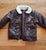 NA This leather like bomber jacket is soft and warm 12 Months
