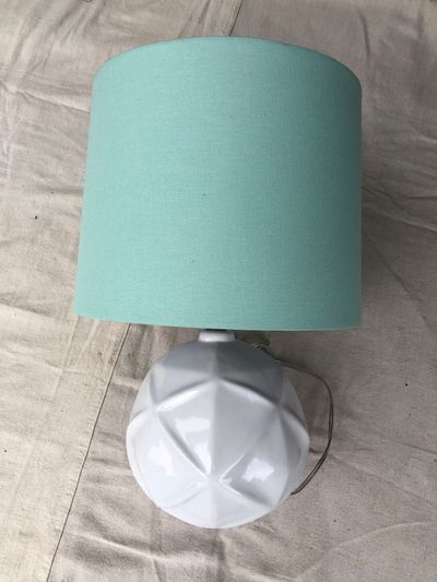White lamp with mint green shade