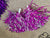 silver and purple pom poms