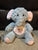 Elephant that says I love you tons on the front Elephant that says I love you tons on the front