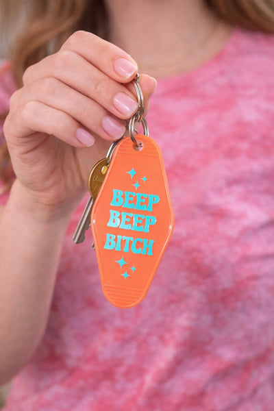 Etsy NEW orange beep beep bitch motel keychain