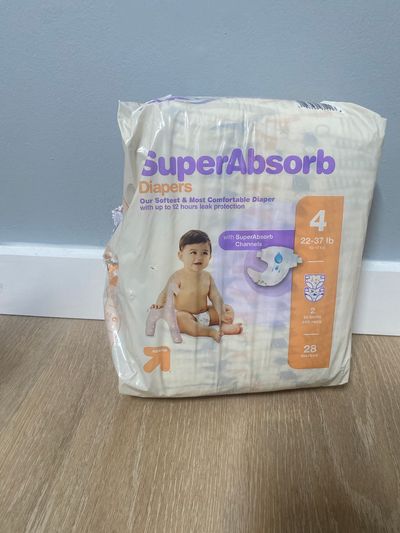 Up and Up Size 4. Small rip on side of bag but never used