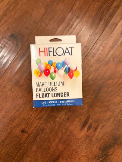 High float spray for helium ballons