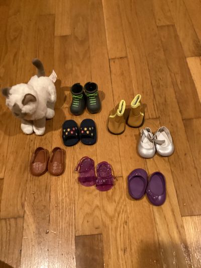 Multiple 18 inch doll shoes and pet