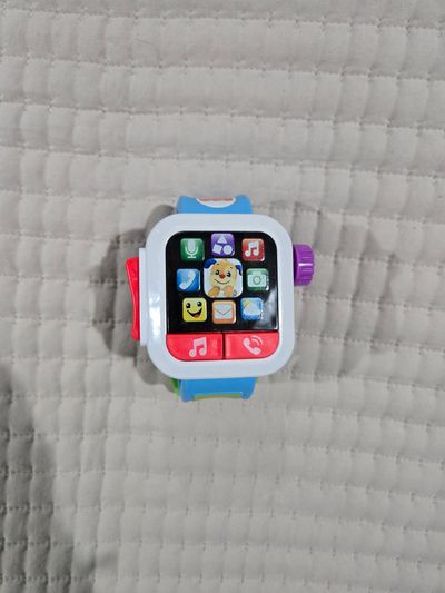 Fisher Price Laugh and Learn Smart watch has a few small minor scuffs