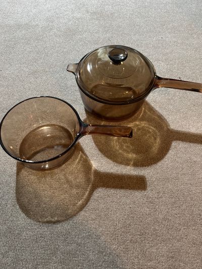 Corning Visions Amber One with lid, one without.