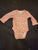 Carter long-sleeve bodysuit features a vibrant orange and black floral p 3 Months