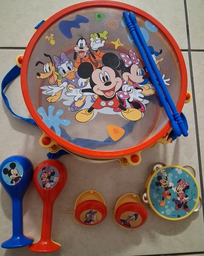 Disney Mickey Mouse Clubhouse Band Set Storage Drum, 2 sticks, tambourine, maracas, castanets.