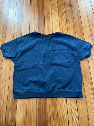Zara Girl NWT    Size 13/14   Distressed blue top with pocket.  SS 14-16