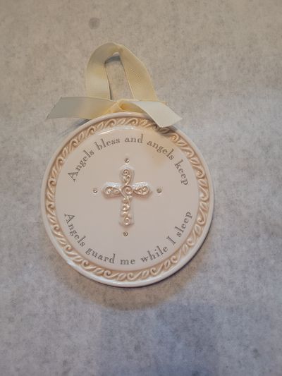 Angels and cross plaques