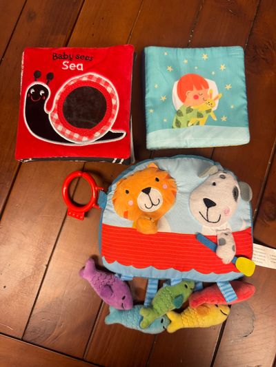 Set of 3 soft Baby Books. One makes crinkle noise Set of 3 soft Baby Books. One makes crinkle noise, one hangs